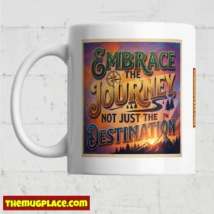 Inspirational mug with a vibrant design: Embrace the journey, not just the destination. THEMUGPLACE.COM logo at bottom left.