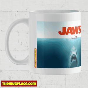 Mug featuring the iconic 1975 film poster from JAWS with a shark underwater and a swimmer above.